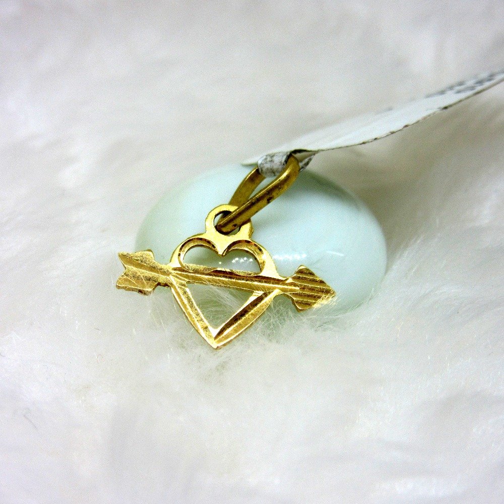 Arrow through the heart symbol pendent