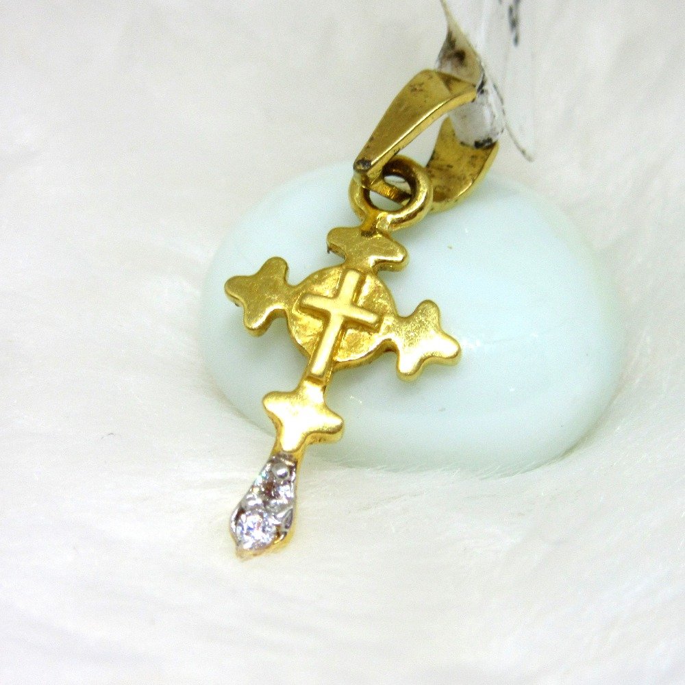 Christian cross gold pendent