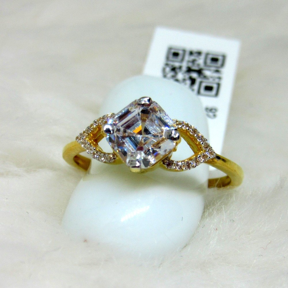 Gold diamond shape single stone ring