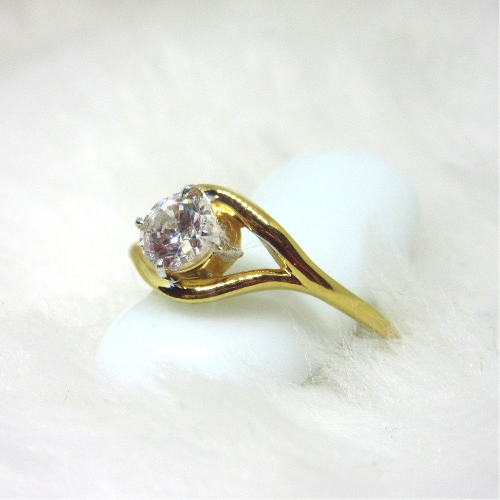 Gold swirl white stone ring