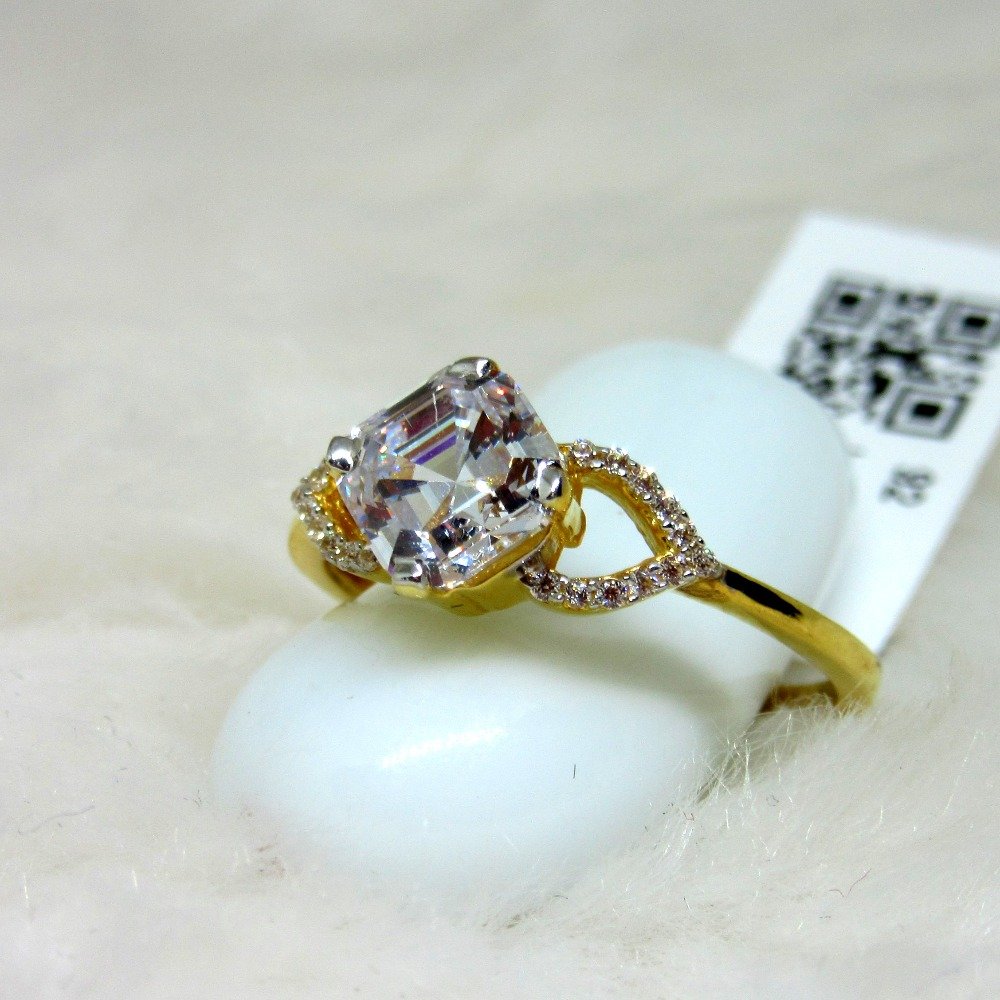 Gold diamond shape single stone ring