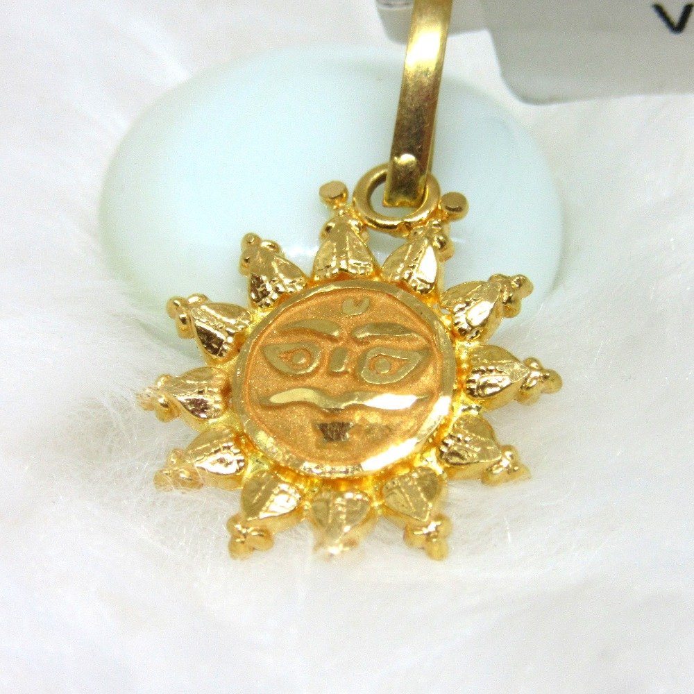 Surya gold pendent