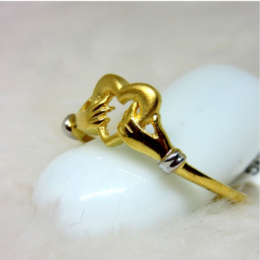 Gold heart with handpair ring